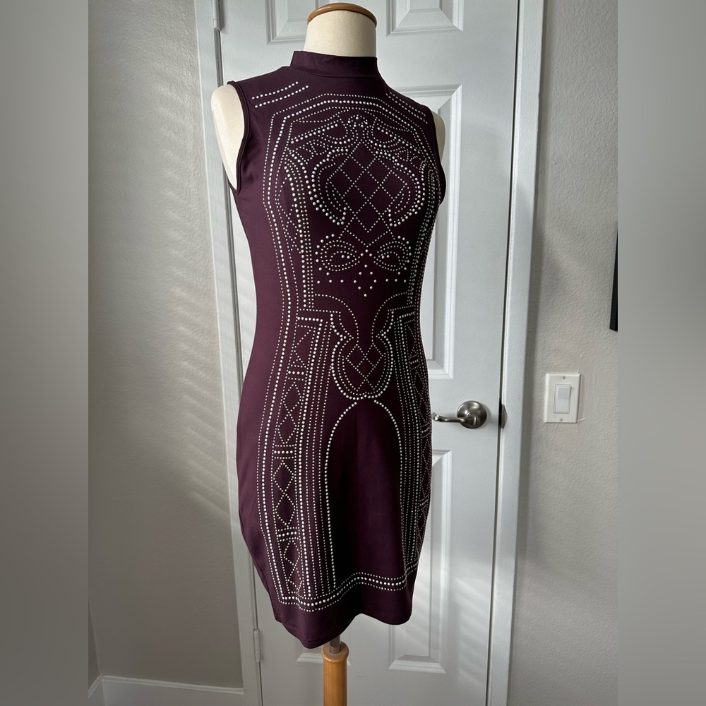 Say What mini sleeveless mock neck dress with embellished design on front